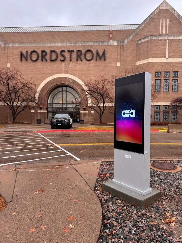 Ara 55-inch freestanding kiosk display outside Nordstrom